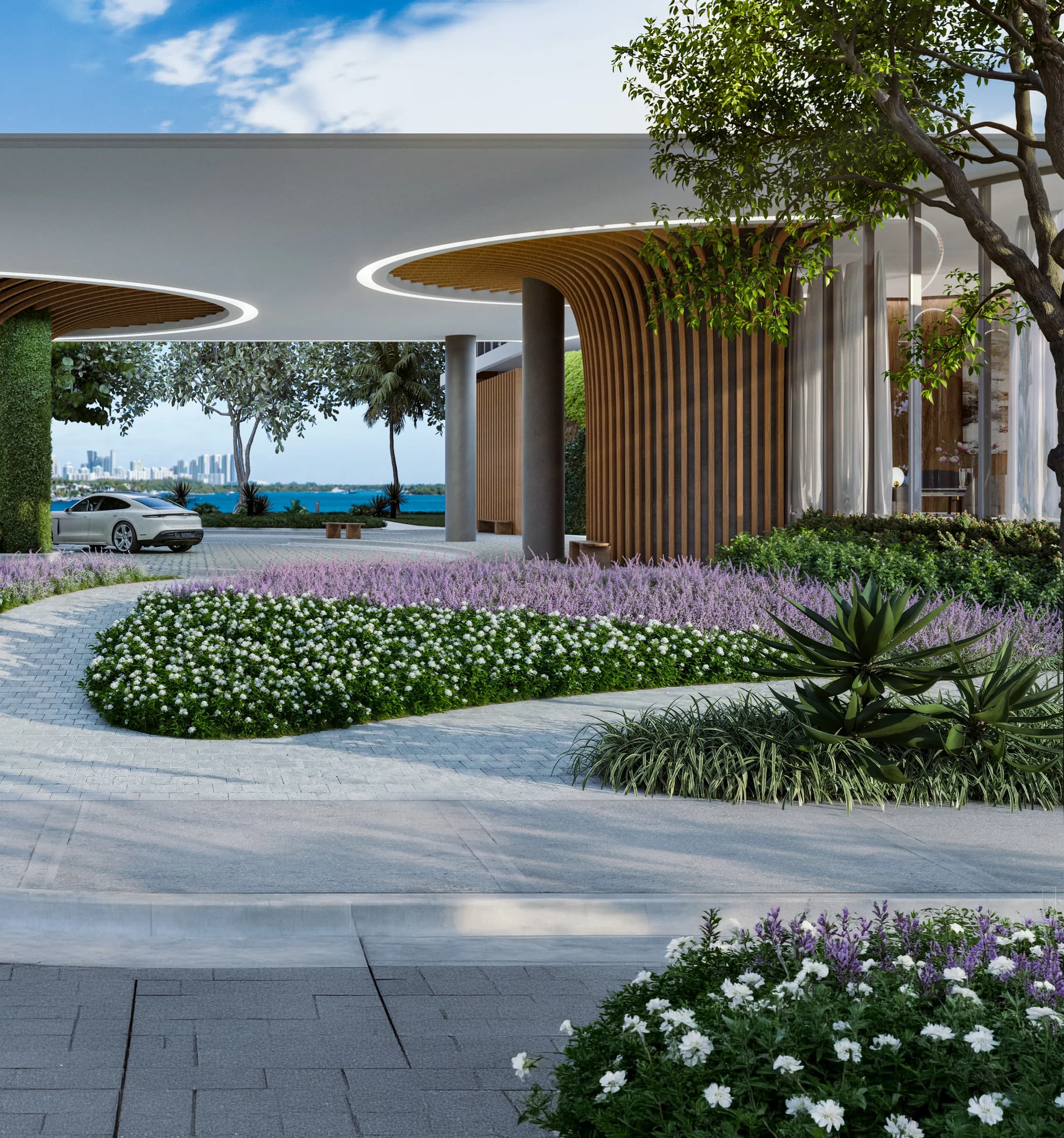 Landscaped motor court and canopy at arrival