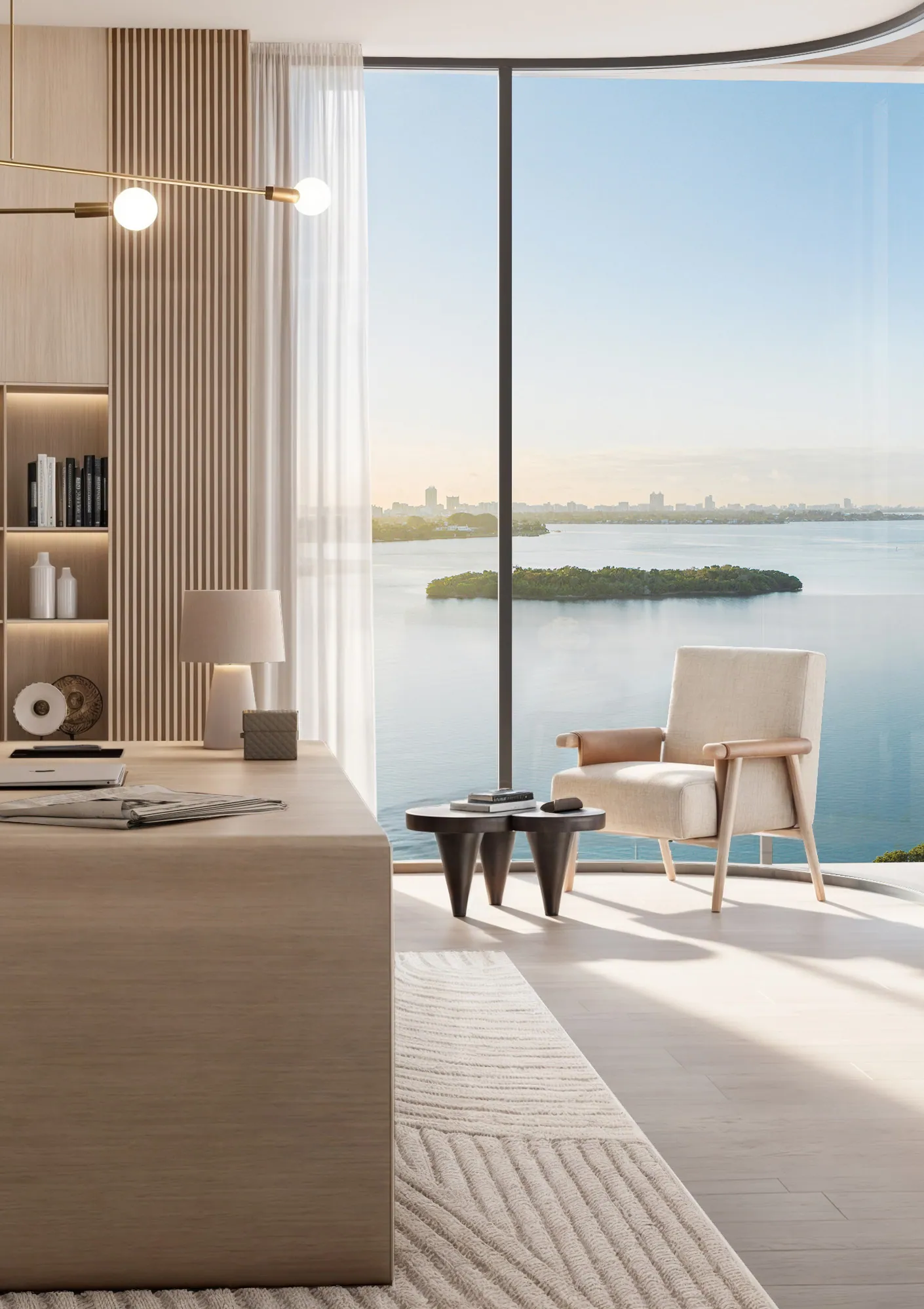 Corner balcony with armchairs reading over the open bay