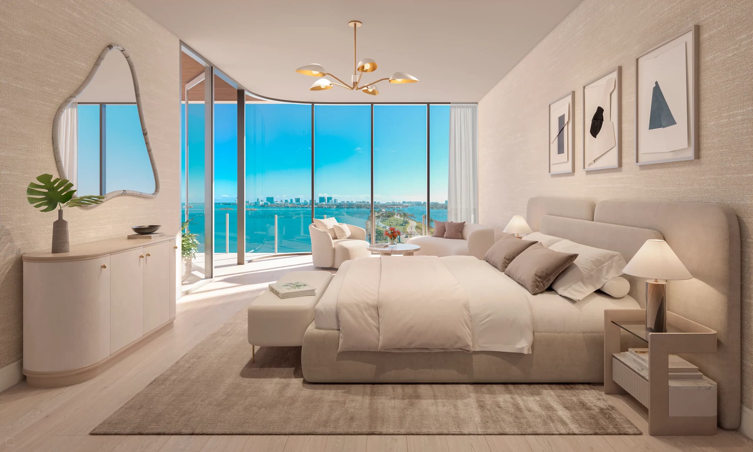 Primary bedroom with organic mirror, brass chandelier and bay view